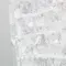 Close-up of sparkling water with ice in a glass, carbonated at home