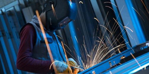 Welder at work, sparks