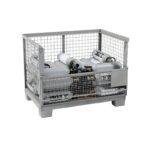 Steel gitterbox half full with 35 filled 5 L CO2 E290 cylinders, flap open
